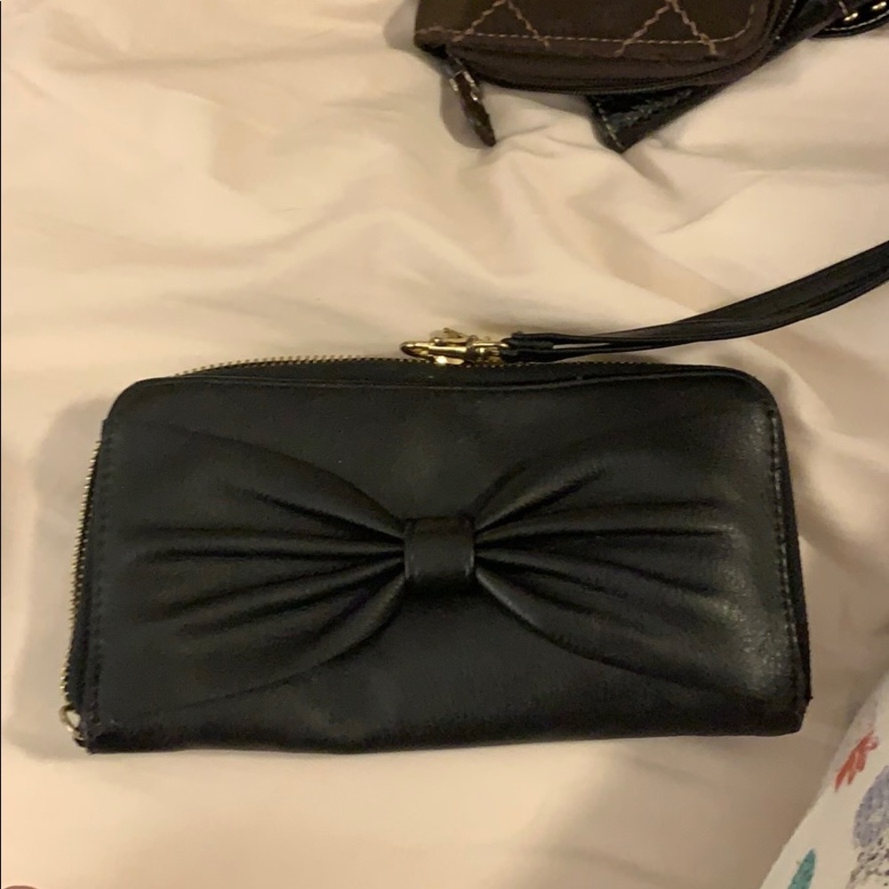 Black wristlet with bow detail